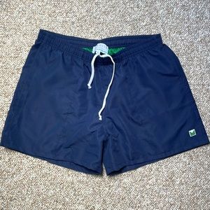 Magill LA navy swim trunks, size L. Never worn, original packaging.